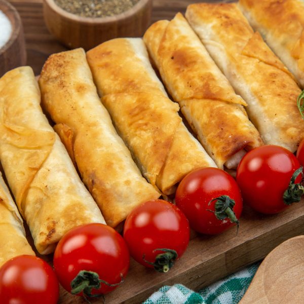 front-close-view-fried-greens-pastries-with-red-to-2026-03-18-08-14-31-utc (1)