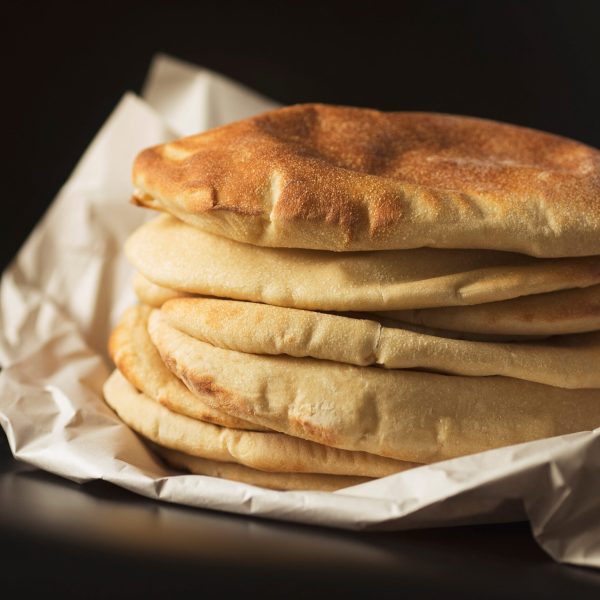 stack-of-tasty-pita-bread-on-white-paper-2026-03-17-21-17-25-utc (1)